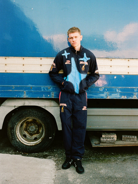 NAVY OLYMPIC TRACK PANTS