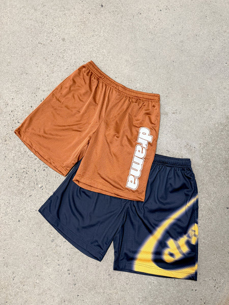 RUST ORANGE STAPLE MESH BASKETBALL SHORTS