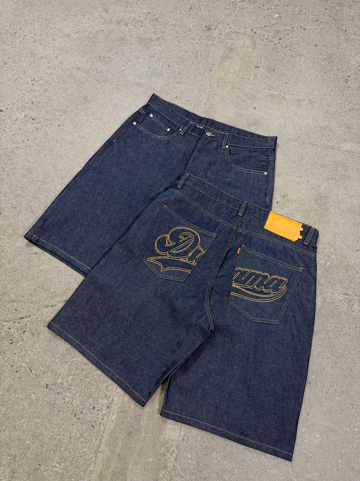 CHAIN STITCH SCRIPT JUMBO JORTS (RAW INDIGO) - New