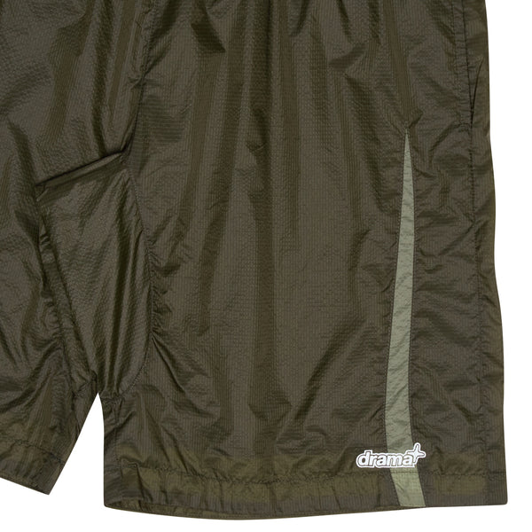 Close-up detail of army green Drama Call ripstop shorts