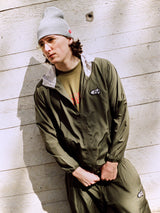 Model wearing army green Drama Call 4sta running shorts