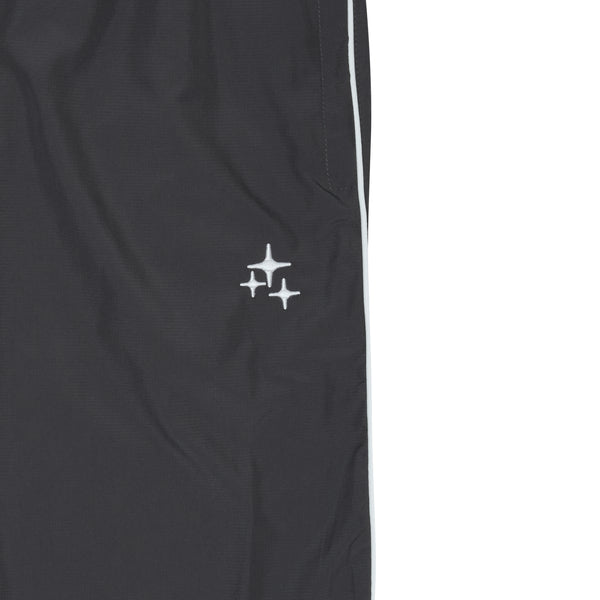Close-up view of ash grey Drama Call STA nylon shorts