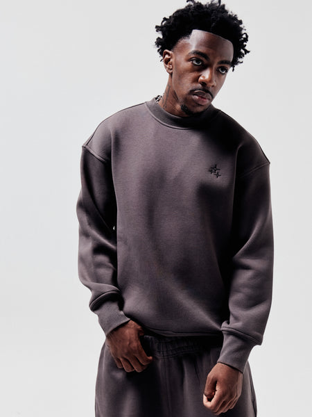 Model wearing ash grey Drama Call STA shorts