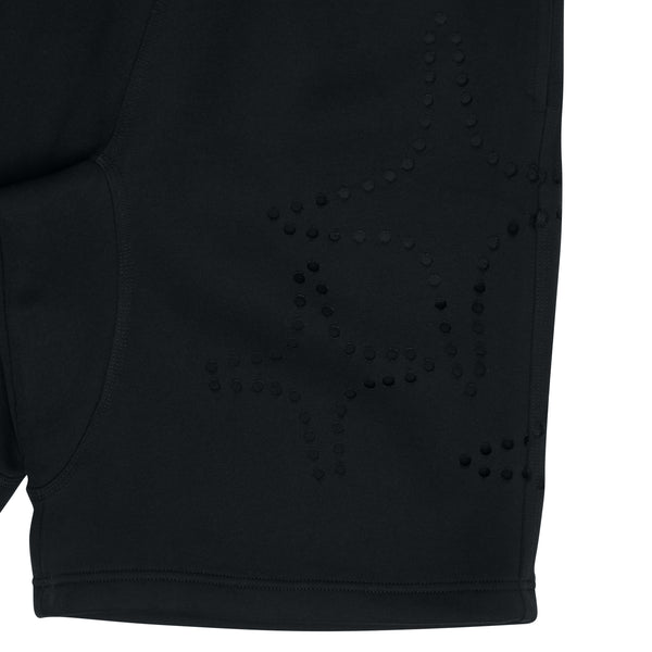 Close-up detail of the black Drama Call 3STA hole shorts 