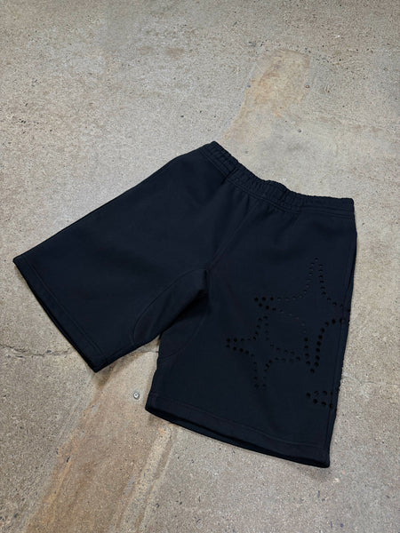 Black Drama Call 3STA hole shorts in a flat lay view