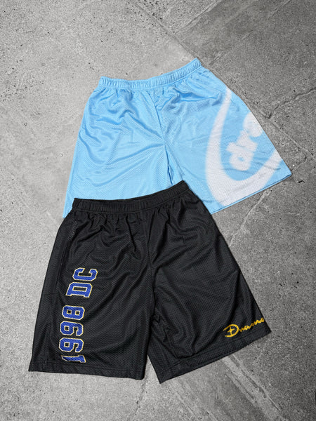Men's black and blue Drama Call mesh shorts in a flat lay view.