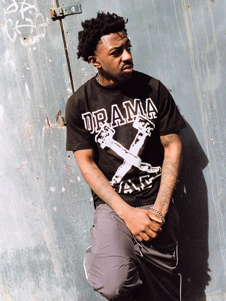 Model wearing the Drama Call black Hammer graphic tee 