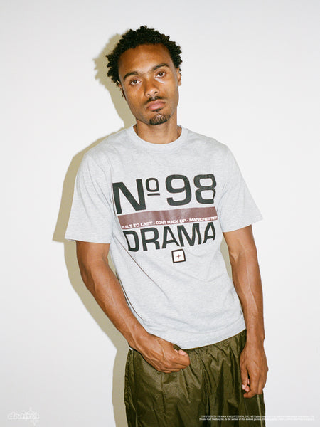 Model wearing the Drama Call No.98 grey graphic tee