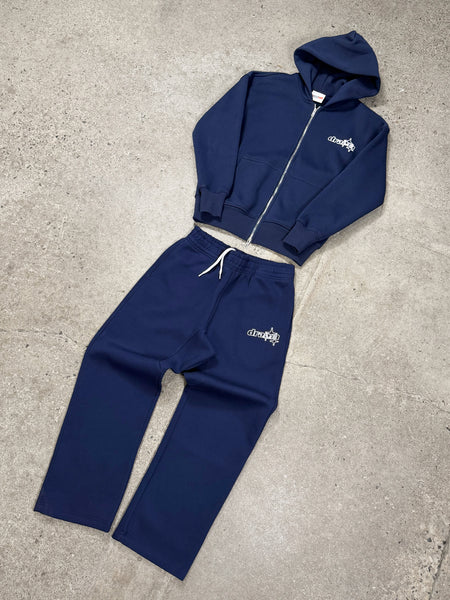 Men's navy Drama Call Line-STA zip-up hoodie and matching joggers in a flat lay view.