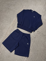 Men's navy Drama Call STA crewneck sweatshirt and matching shorts in a flat lay view.