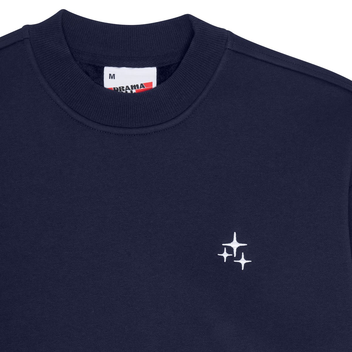 Close-up of the navy Drama Call STA crewneck 