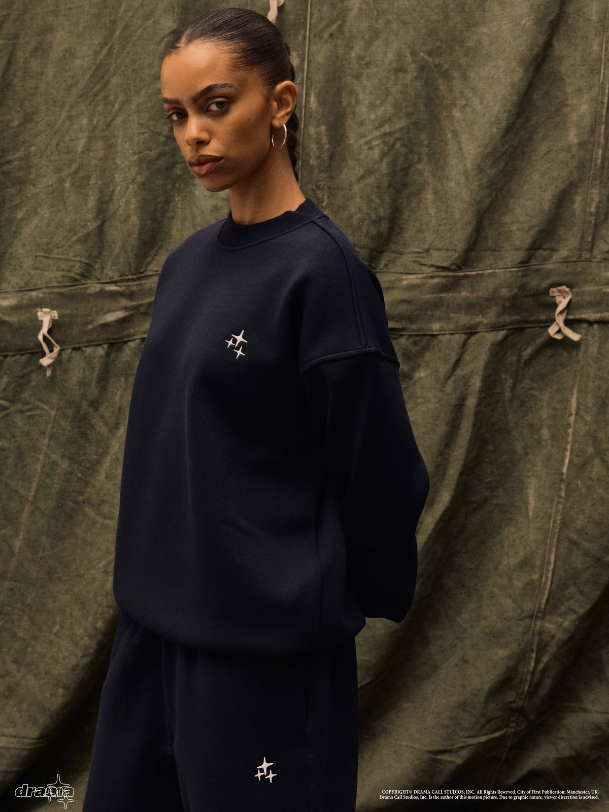 Model wearing navy Drama Call STA crewneck 