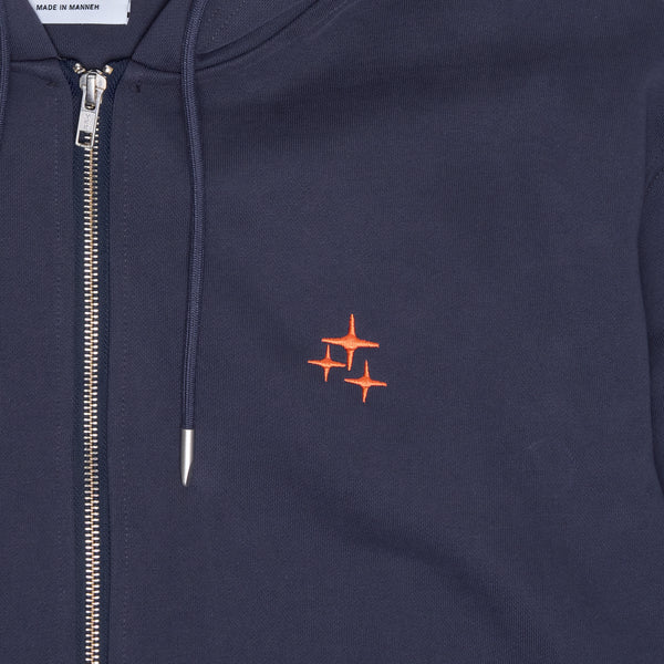 Close up view of the navy Drama Call STA zip-up hoodie